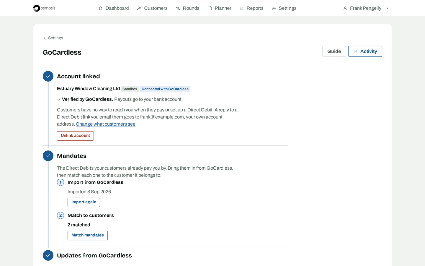 The GoCardless page on a laptop: account linked and verified, mandates imported and matched, updates arriving.