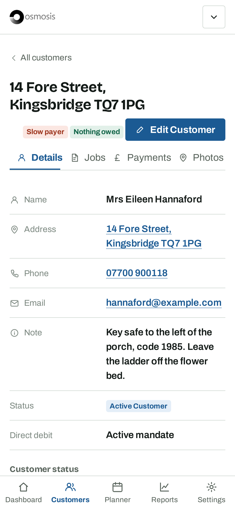 A customer's page on a phone: name, address, phone, email and a note about the key safe.